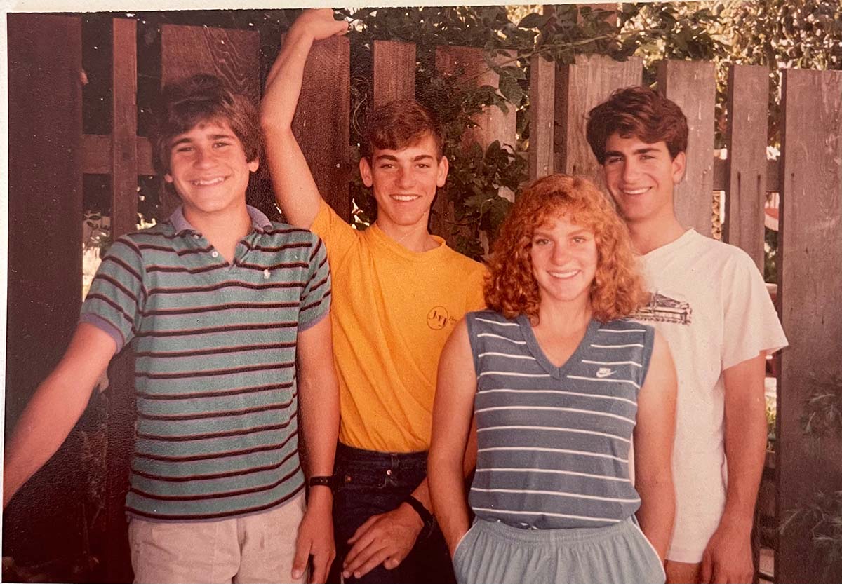 1970s photo of Carol, Michael, Paul, and Brian as teenagers